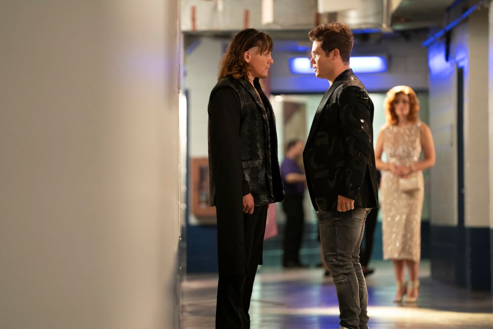 Keefe and Kelvin stand and face each other in the hallway of the church in The Righteous Gemstones Season 3 Episode 8, "I Will Take You by the Hand and Keep You."