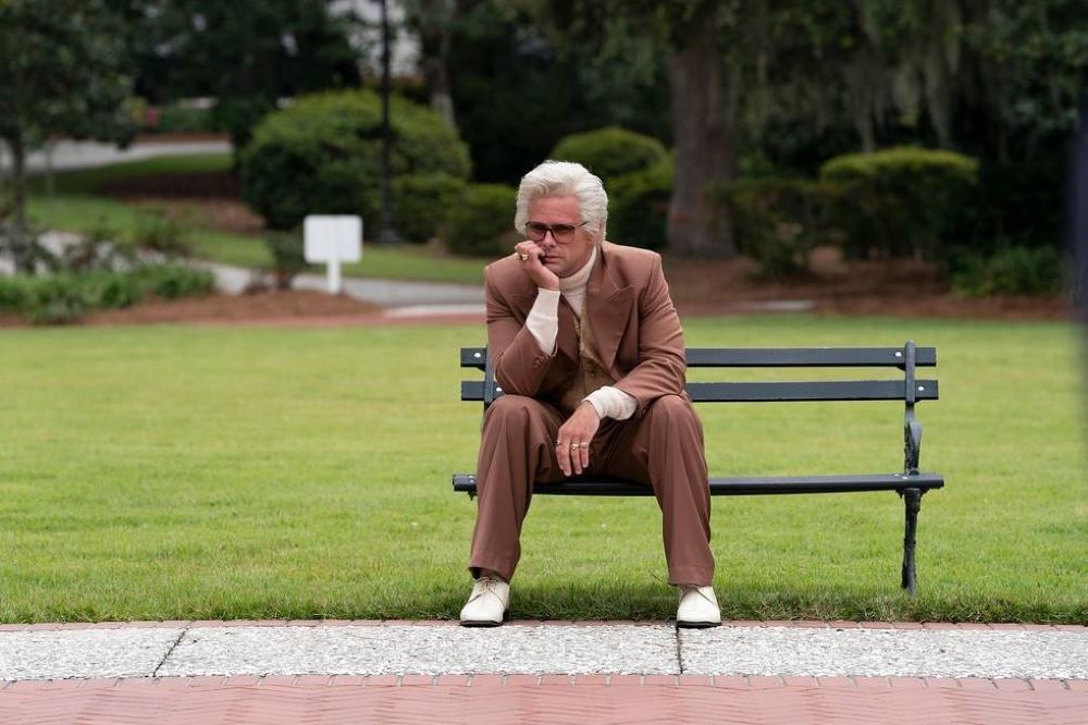 Uncle Baby Billy sits on a bench outside with his chin in his hand while looking sad in The Righteous Gemstones Season 3 Episode 4, "I Have Not Come To Bring Peace, But a Sword."