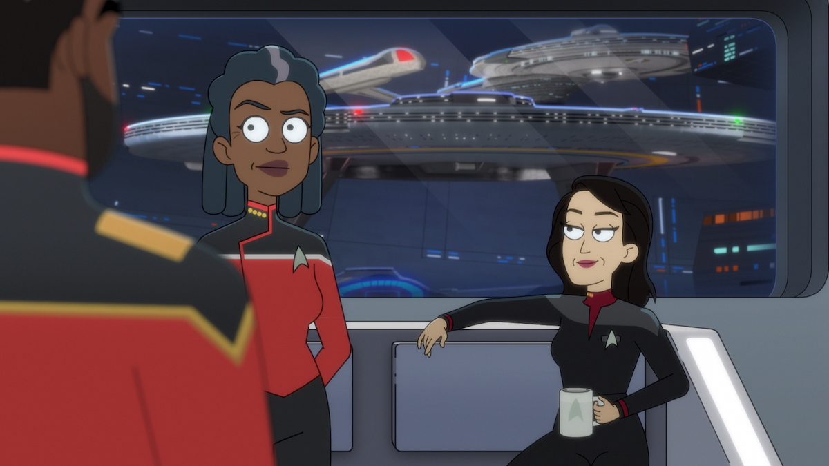  Phil Lamarr as Admiral Freeman, Dawnn Lewis as Captain Carol Freeman and Lycia Naff as Captain Gomez of the Paramount+ series STAR TREK: LOWER DECKS. They are having a discussion in Admiral Freeman's office at the Starbase. The Cerritos is visible in the background.