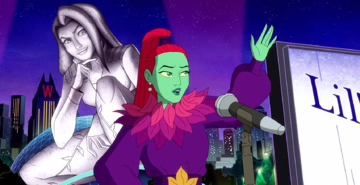 Ivy wears a purple long-sleeved dress with her hair in a ponytail while standing on a stage and waving in Harley Quinn Season 4 Episode 6, "Metamorphosis."