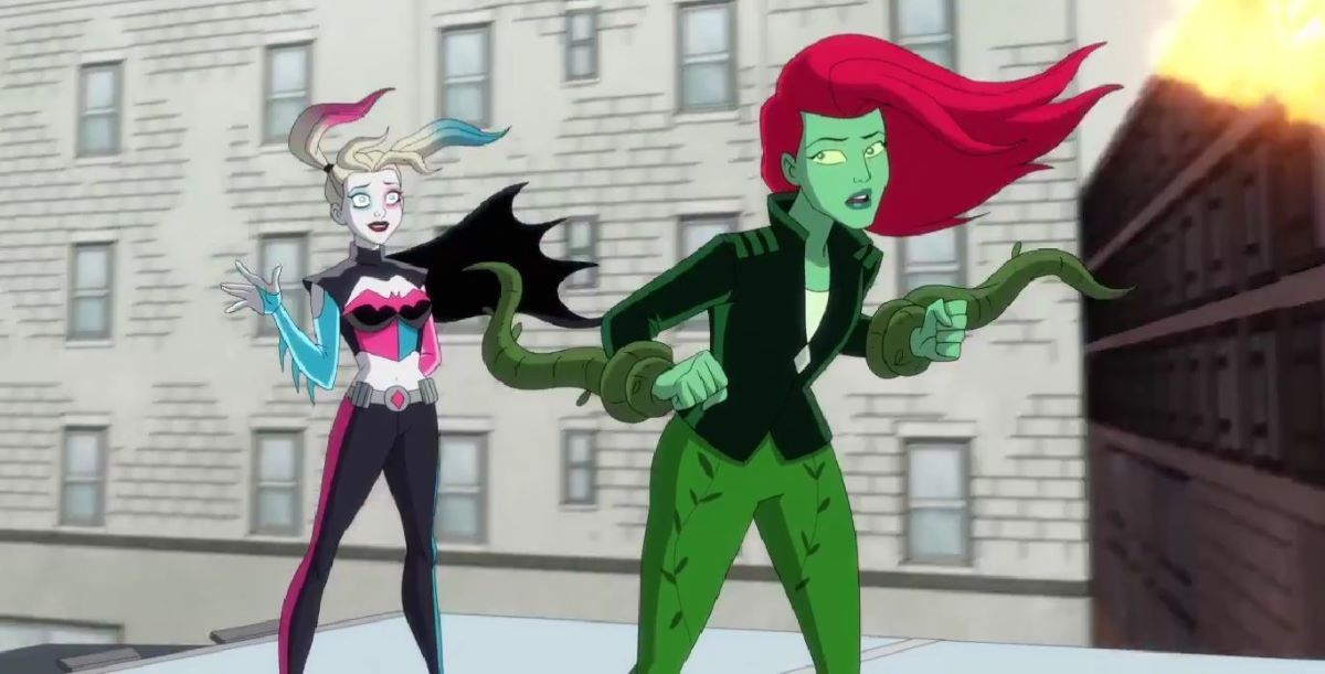 Harley wears her Bat Fam uniform while standing on top of a truck with her arms crossed as Ivy looks back at her in Harley Quinn Season 4 Episode 7, "The Most Culturally Impactful Film Franchise of All Time."