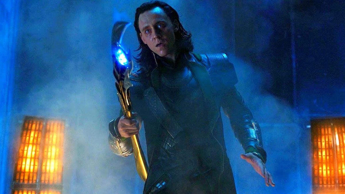 Loki (Tom Hiddleston) holding the scepter in The Avengers.