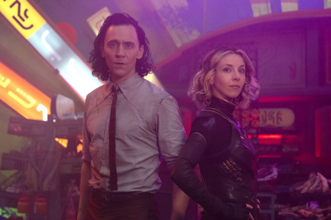 Loki (Tom Hiddleston) and Variant Sylvie (Sophia Di Martino) in Loki season 1.