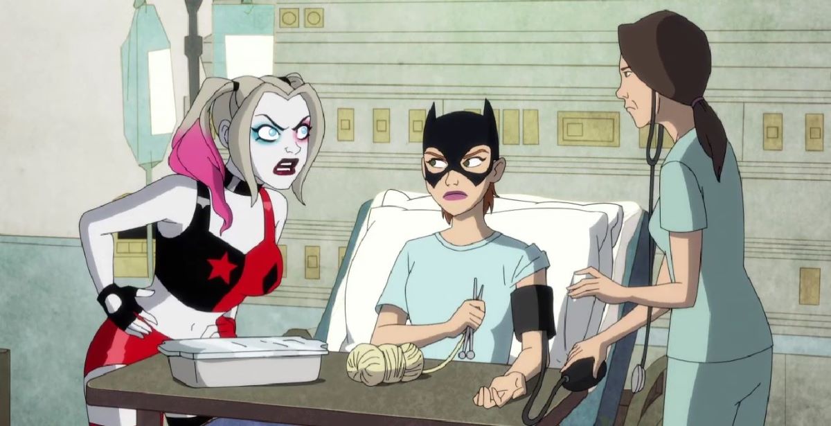 Harley and a nurse stand over Barbara Gordon, who's sitting in a hospital bed, while arguing in Harley Quinn Season 4 Episode 10, "Killer's Block."