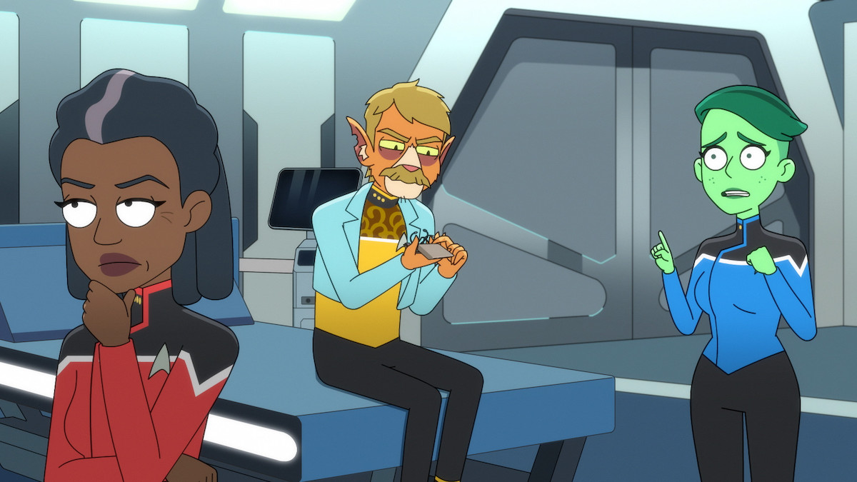T'illups sits in the med bay while Tendi stands next to him and chats with Carol Freeman, whose back is turned, in Star Trek: Lower Decks Season 4 Episode 1, "Twovix."