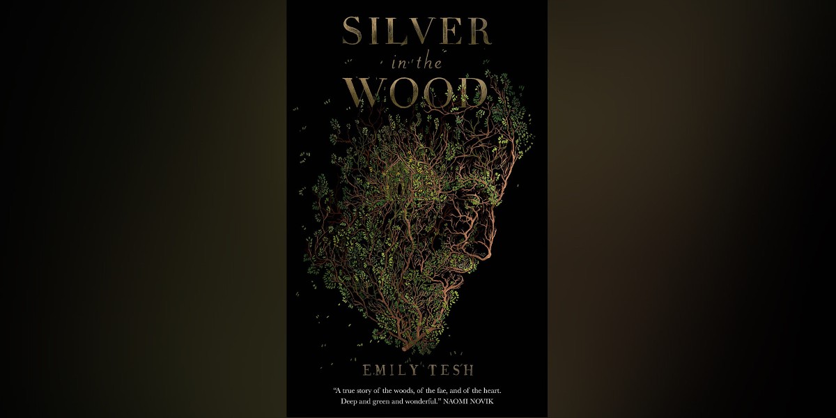 Silver in the Wood has a black cover with a face in profile made of green and brown branches.