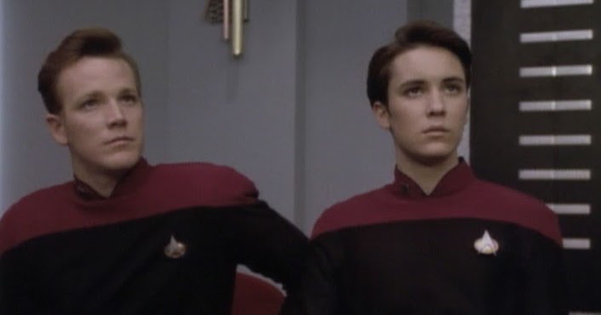 Nick Locarno (Robert Duncan McNeill) and Wesley Crusher *(Wil Wheaton). They are both wearing red TNG-era Starfleet uniforms.