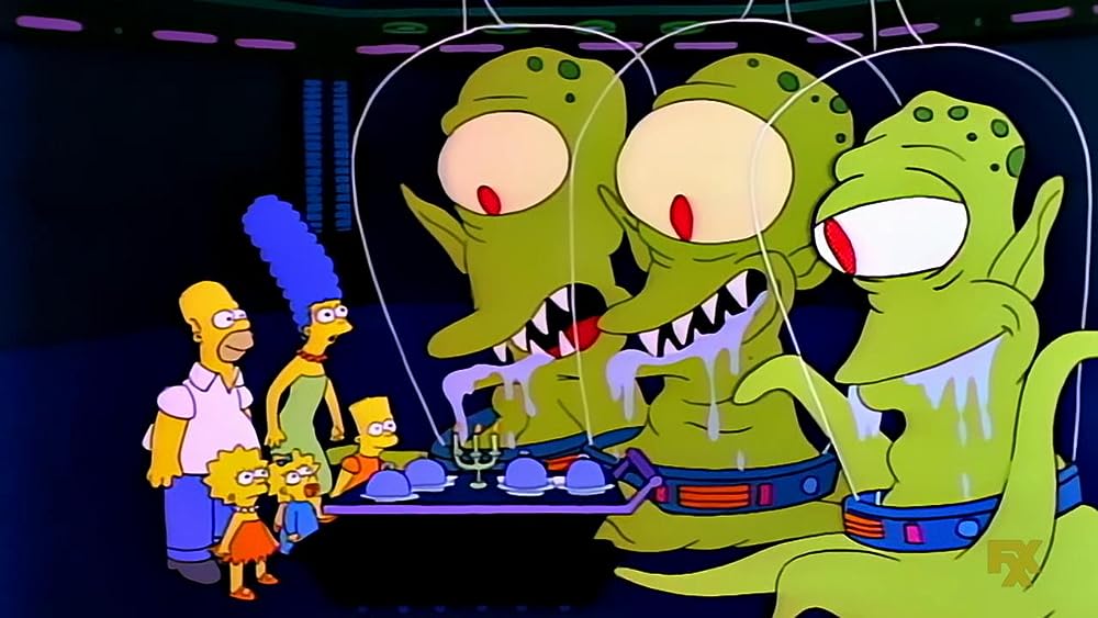 The Simpsons family sits at a nice dinner with aliens Kang and Kodos.