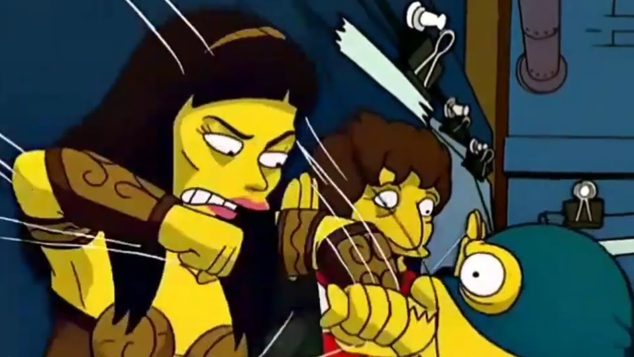 Xena grabs and punches comic book guy.