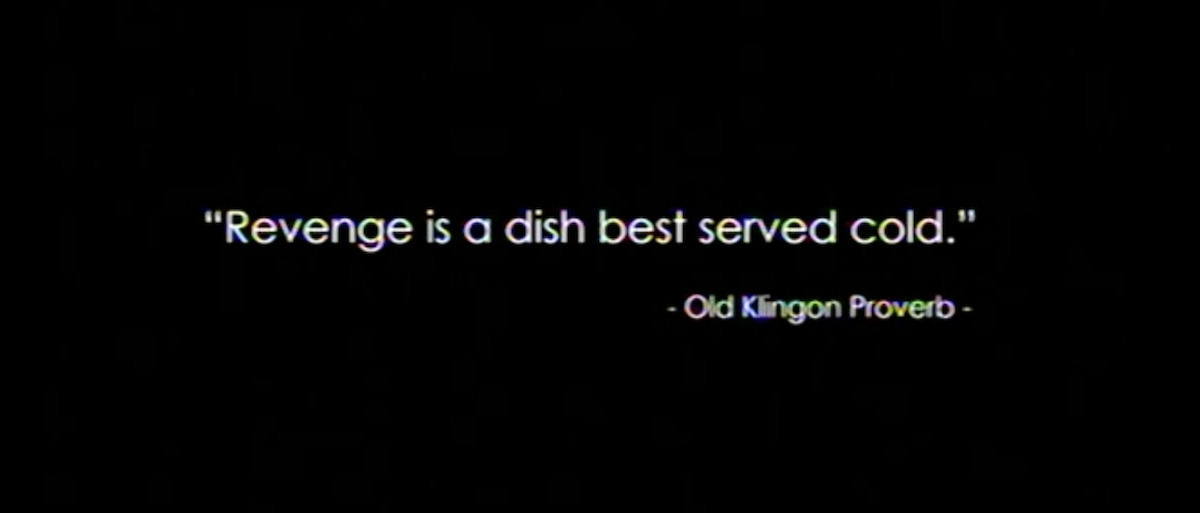 A black background with the text "Revenge is a dish best served cold" in white text with "Old Klingon Proverb" underneath it in smaller white text.