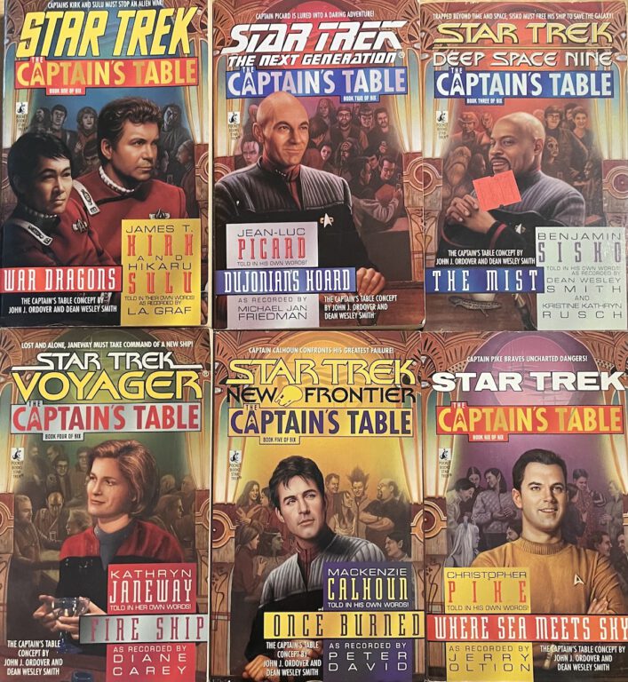 The six Star Trek: Captain's Table novels, each one spotlighting one (or two) Starfleet Caps.