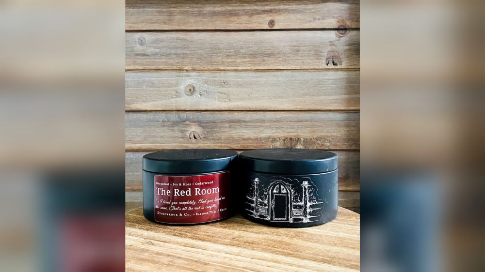 A candle inspired by the Flanaverse series The Haunting of Hill House, featuring the text "The Red Room" in white.