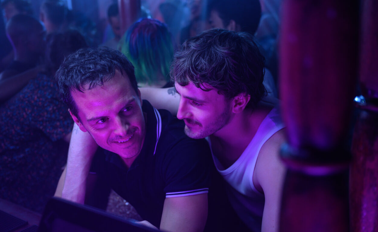 Best of 2023 -- Paul Mescal leans heavily on Andrew Scott as they are bathed in purple light.