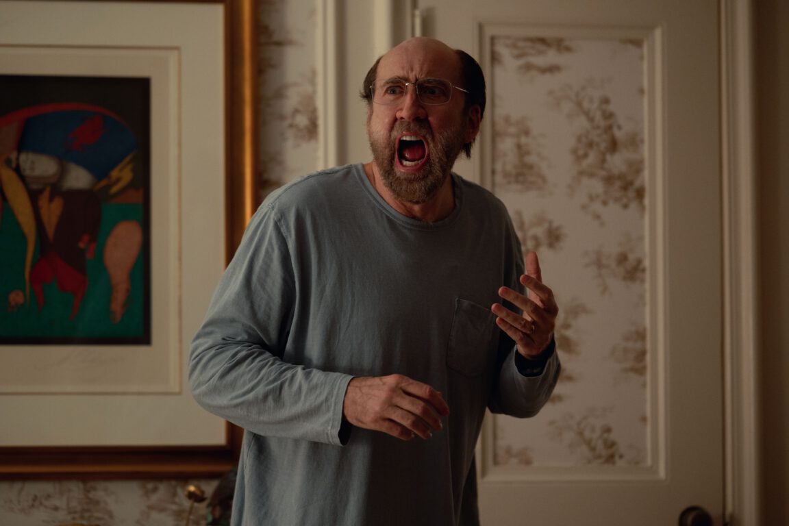 Nicolas Cage shouts in frustration in Dream Scenario.