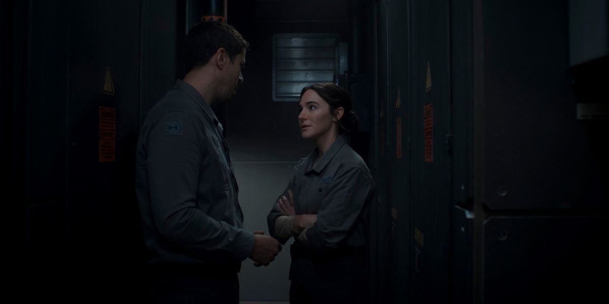 Miles and Sam chat in an empty hallway on the Happy Valley Martian base in For All Mankind Season 4 Episode 4, "House Divided."