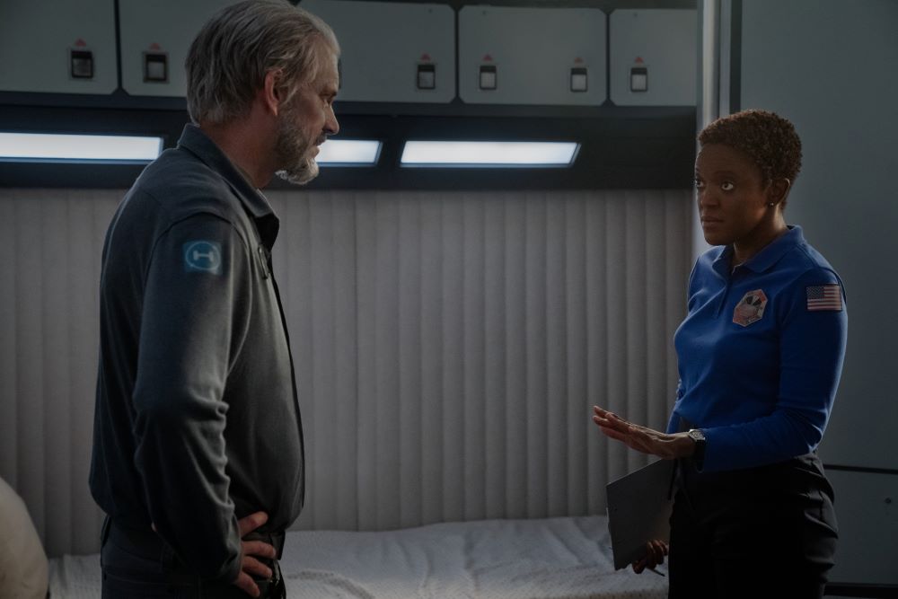 Ed Baldwin talks to Commander Danielle Poole in her quarters on the Happy Valley Martian base in For All Mankind Season 4 Episode 4, "House Divided."