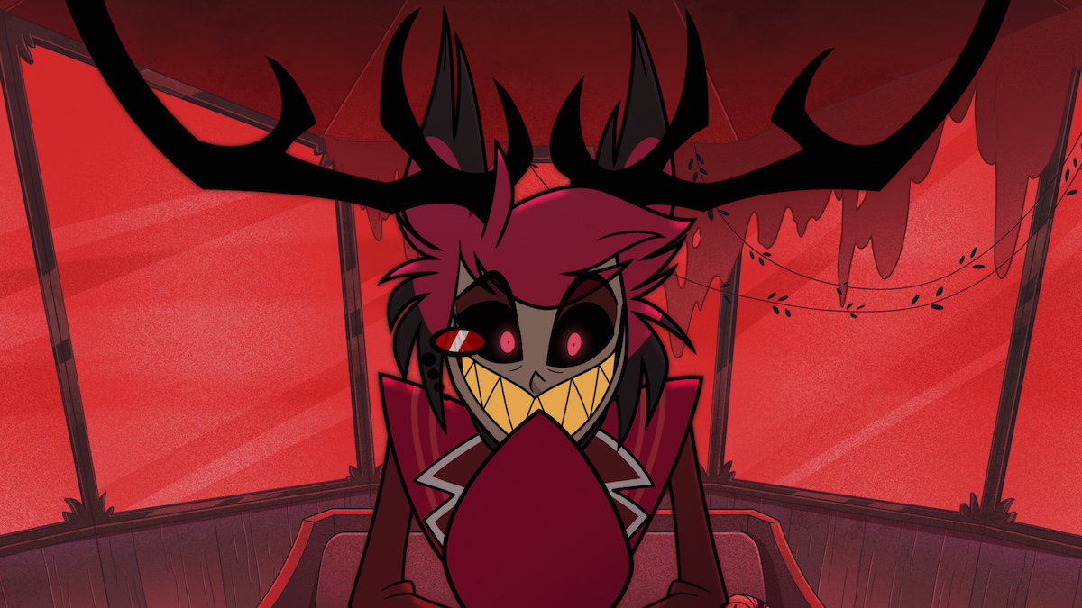 Alastor (Amir Talai), the long lost Radio Demon, adopting a menacing antler'd form in his radio tower atop Hazbin Hotel.