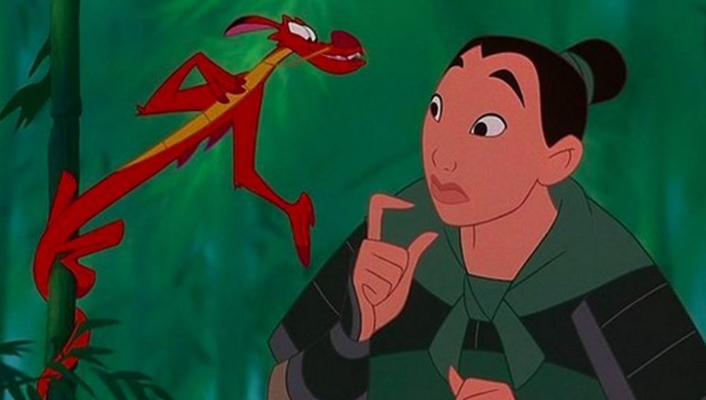 Little red dragon leans off of bamboo toward Mulan, who wears an old-style Chinese Army uniform. 