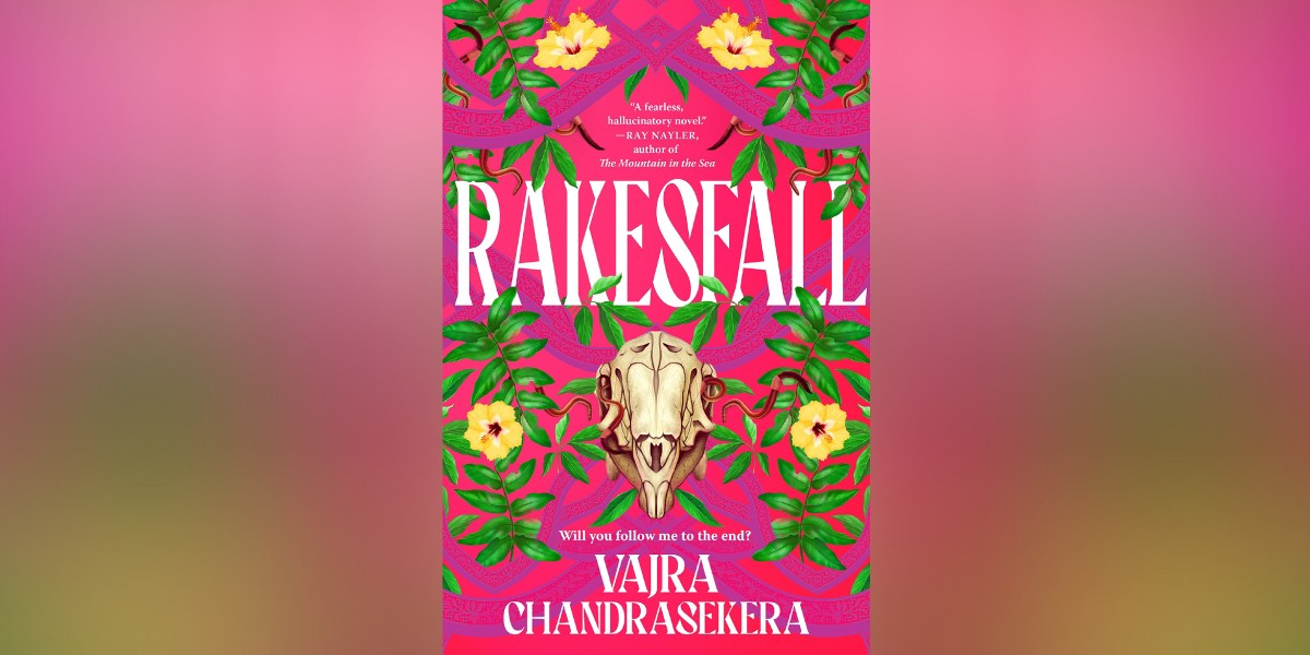 The cover of Rakesfall is bright pink with a bleached animal skull in the center. The skull is surrounded by white and green flowers and abstract purple designs.