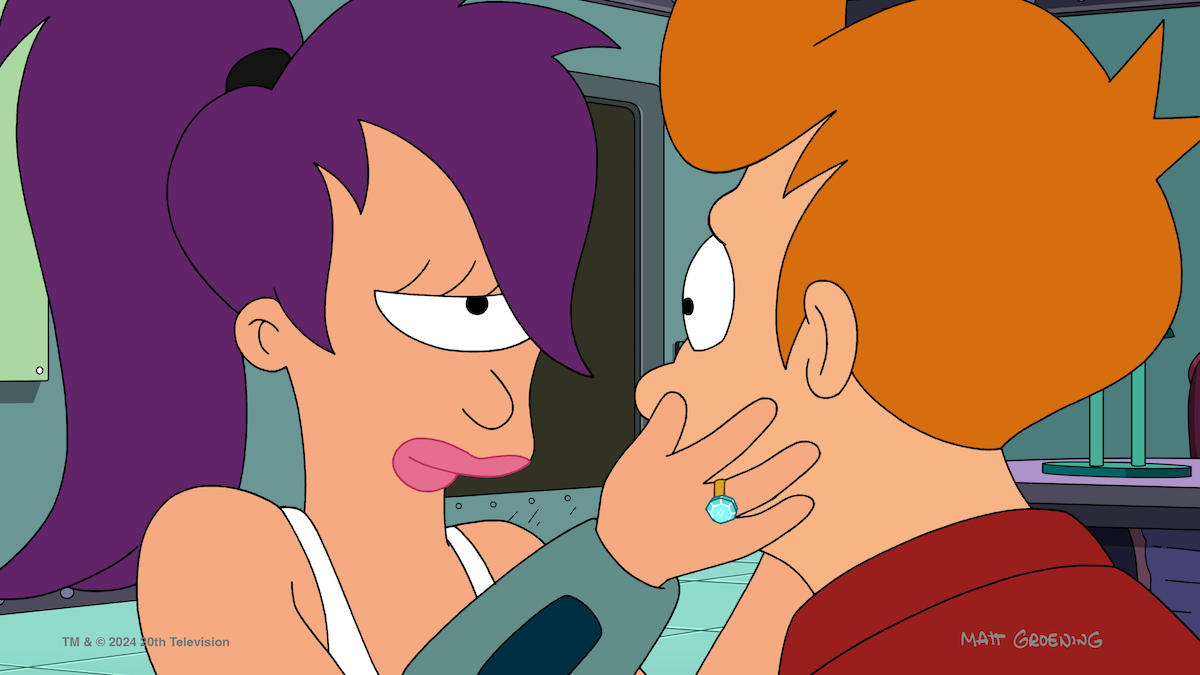 Leela cradles Fry's face, an engagement ring on her finger, in the Futurama season 12 finale, "Otherwise."