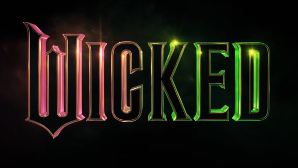 Title art for Wicked in green and pink on a black background.
