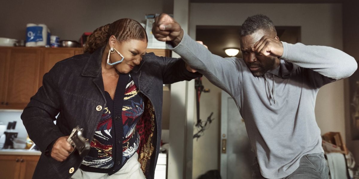 Queen Latifah as Robyn McCall on "The Equalizer" fist-fighting a man.