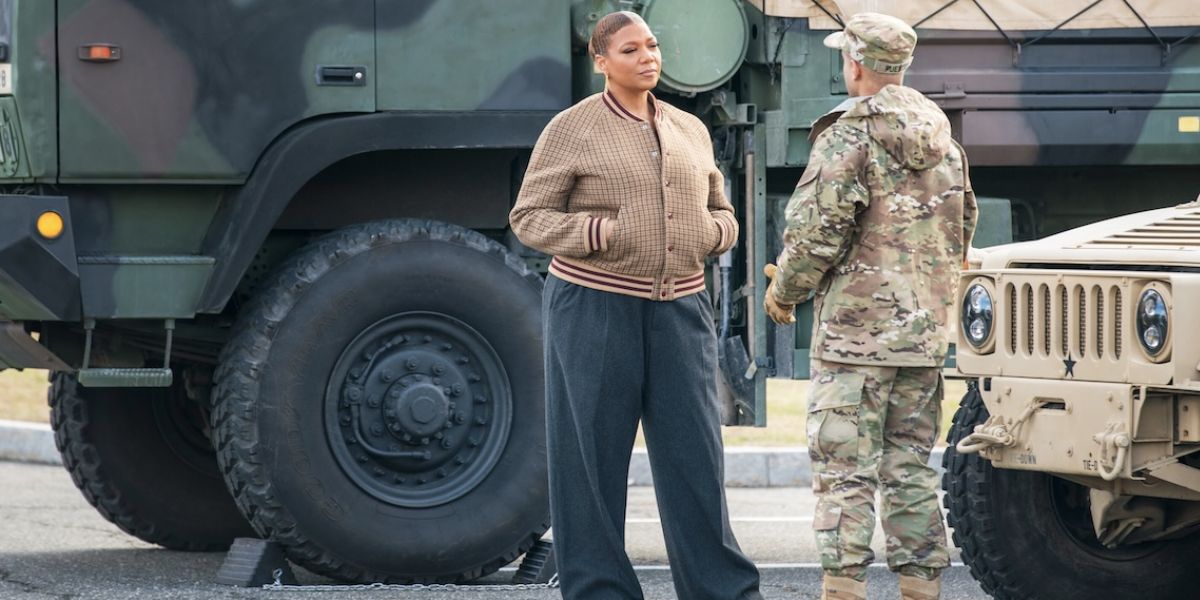 Robyn talking to a soldier on "The Equalizer."