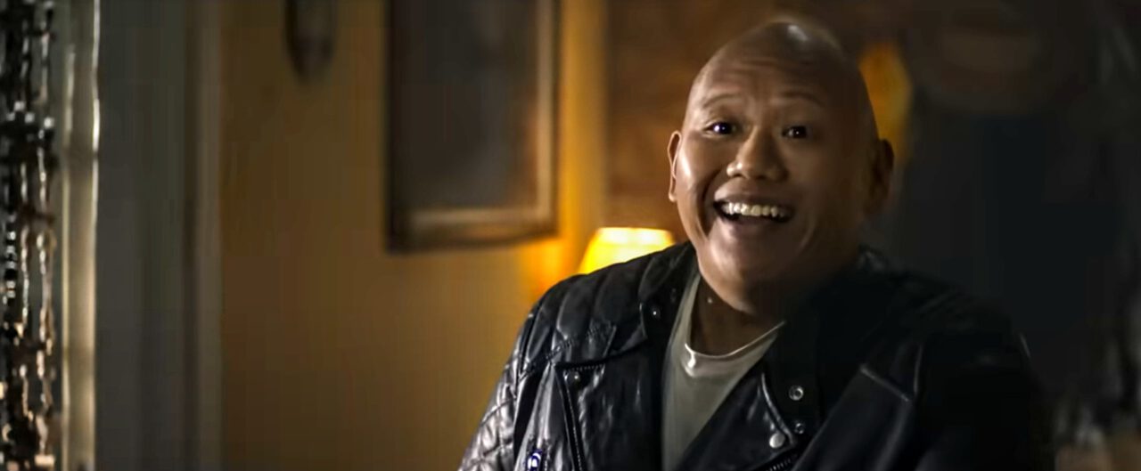 Roscoe (Jacob Batalon) tosses a knife to Nate