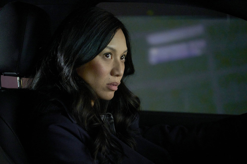 Lomax sits in a car at night on SurrealEstate Season 3 Episode 3, "Death Does a Refi."