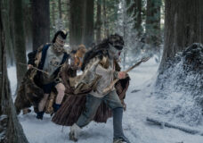 The teens wear furs and mismatched clothing while brandishing weapons and running through the snowy woods on Yellowjackets Season 3 Episode 10, "Full Circle."