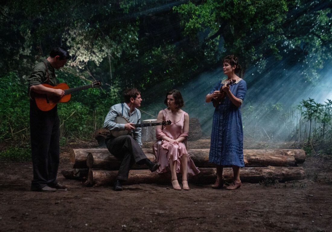 Vampires Bert (Peter Dreimanis), Joan (Lola Kirke) and Remmick (Jack O' Connell) serenade Mary (Hailee Steinfeld) in Sinners