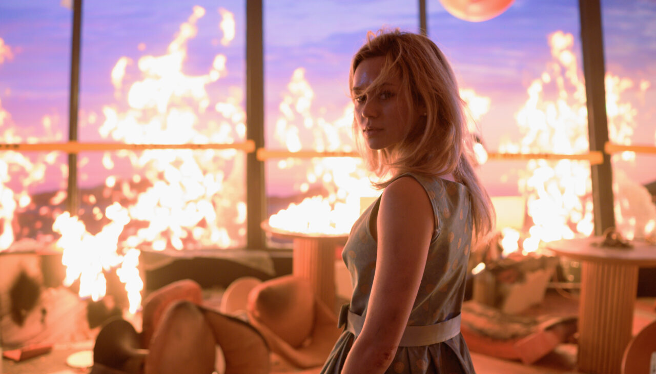 Iris (Brec Bassinger) survives a fire in Final Destination: Bloodlines