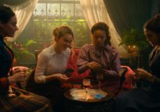 Lizzy, Jinny, Conchita and Mabel sit together in a naturally lit sitting room while chatting on The Buccaneers Season 2 Episode 7, "All Rise."